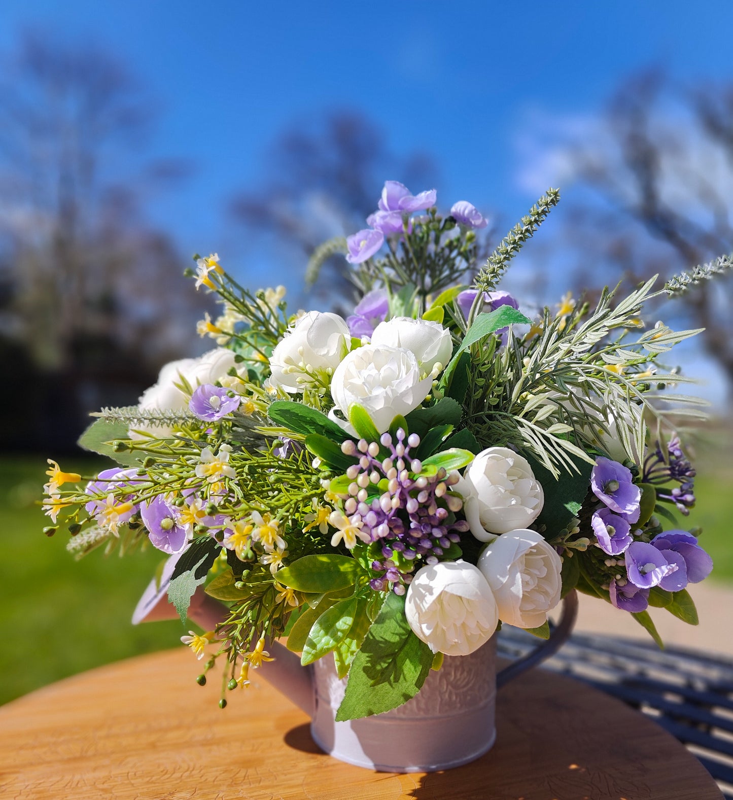 Flower arrangement watering can planter lilac lavender pinks