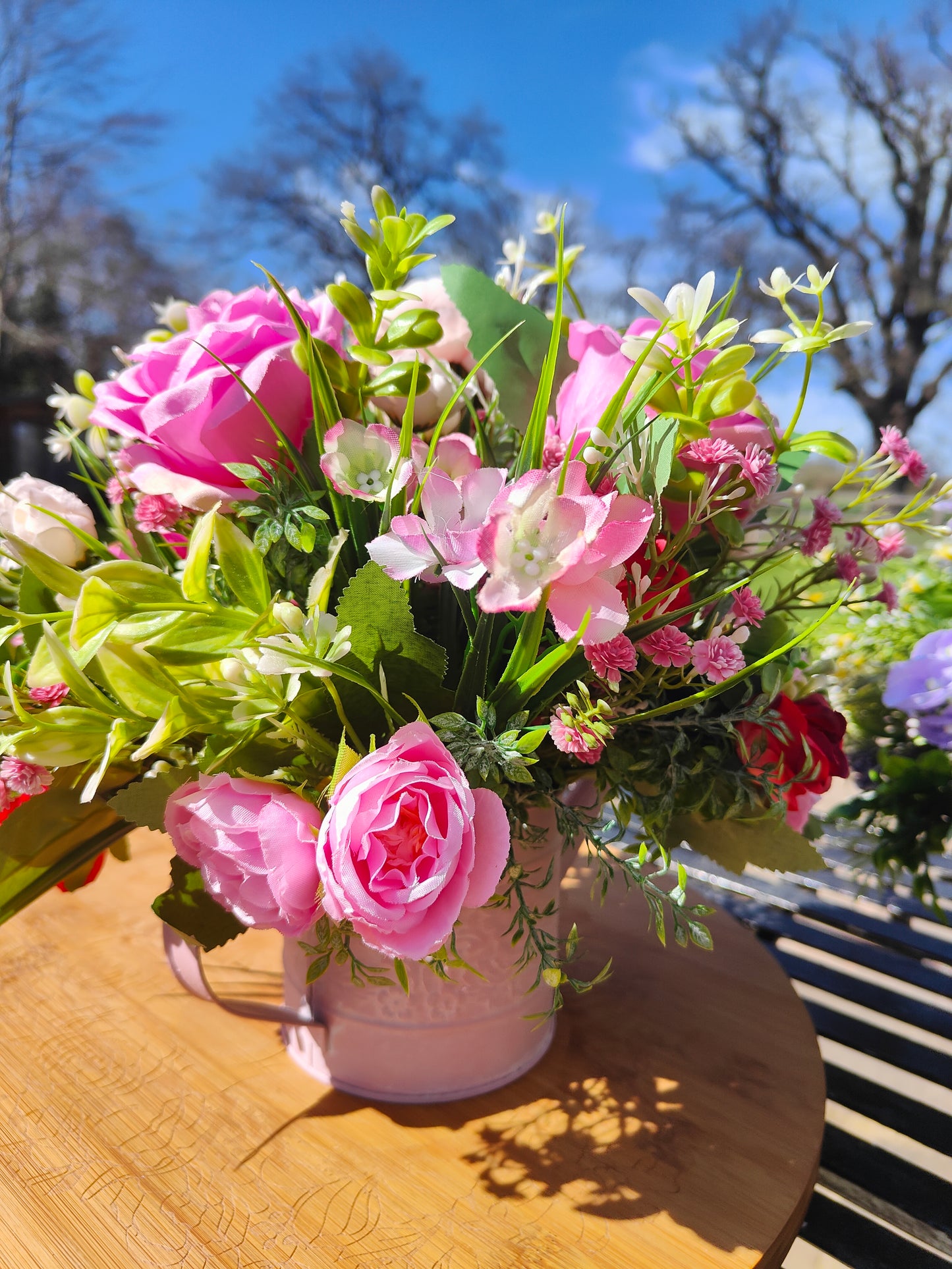 Flower arrangement watering can planter lilac lavender pinks