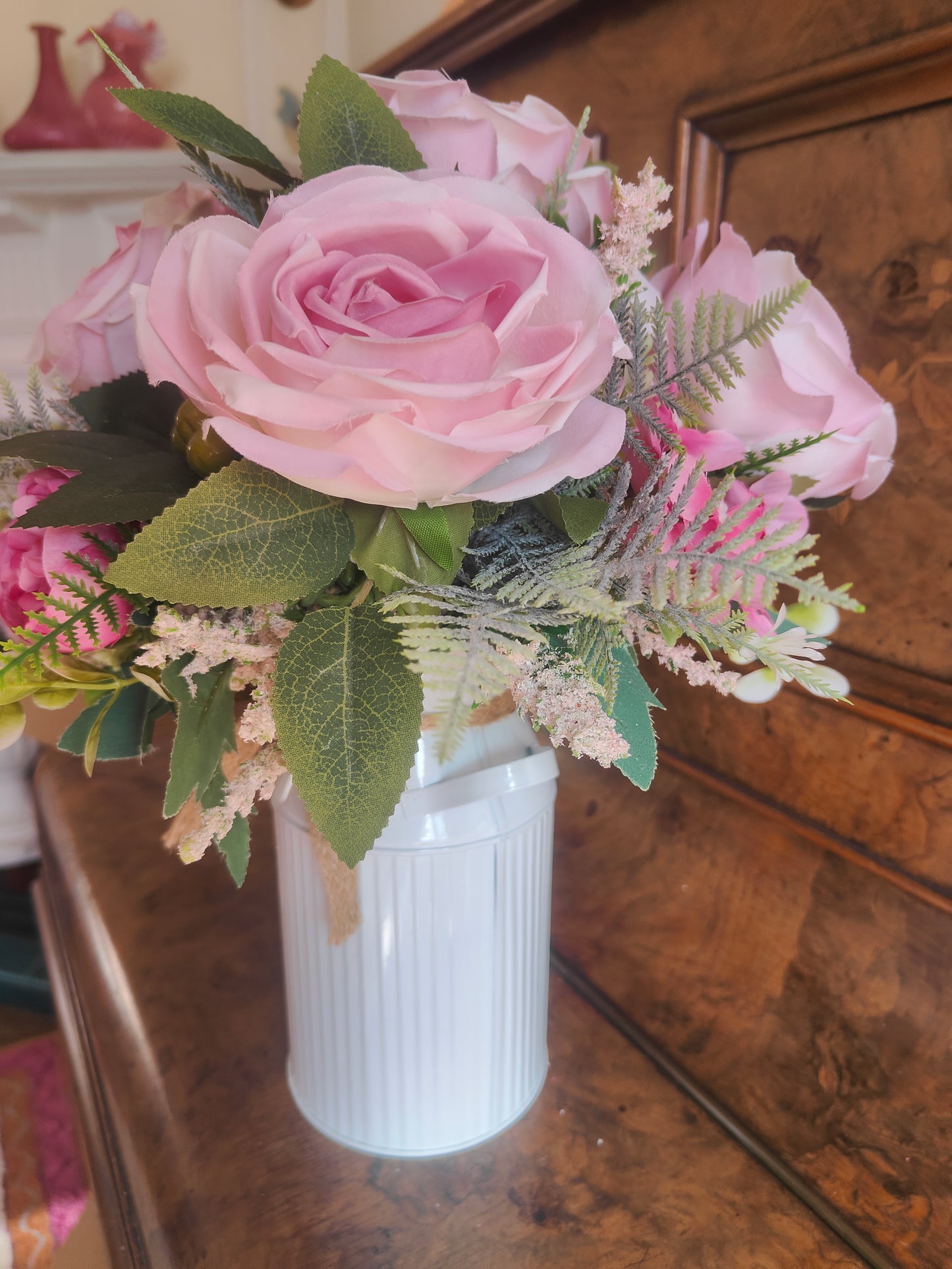 Pink flower arrangement milk churn centrepiece wedding flowers gift
