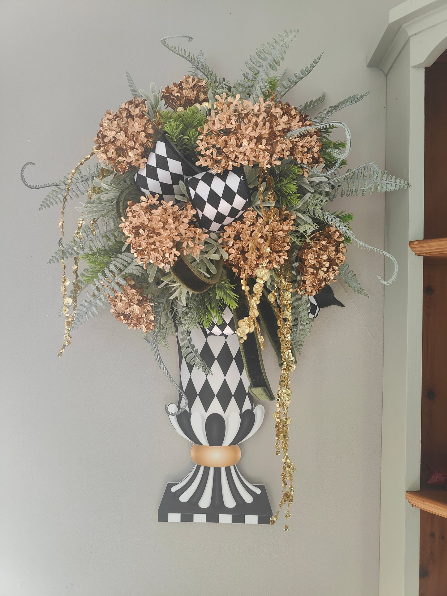 Vase wreath wall decor Mackenzie Childs style vibes Christmas swag